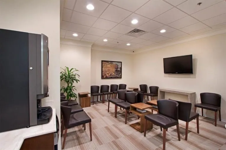 Office tour photo - waiting room with TV & picture