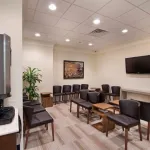 Office tour photo - waiting room with TV & picture